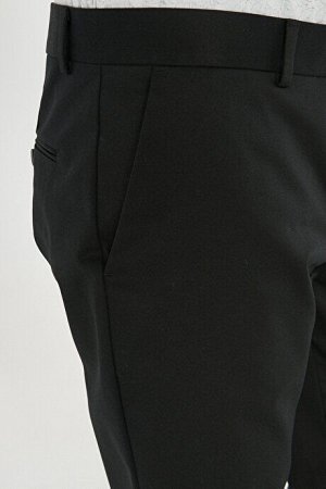 Черные эластичные хлопковые брюки узкого кроя без утюга