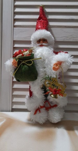 Санта Размер 30см.Фигурку можно поставить на полку или под елку. Санта Клаус - символ Нового года. Он несет в себе волшебство и красоту праздника. Создайте в своем доме атмосферу веселья и радости, ук