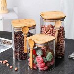 Стеклянная банка с бамбуковой крышкой и ложкой