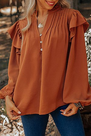 Оранжевая блузка с оборками и длинным объемным рукавом