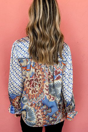 Голубая блуза с геометрическим и цветочным принтом