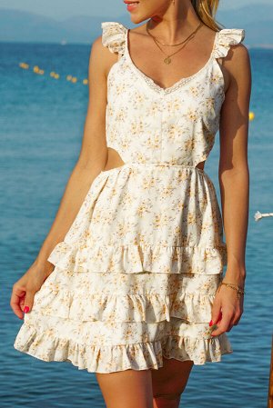 Белое платье с вырезом на талии и желтым цветочным принтом