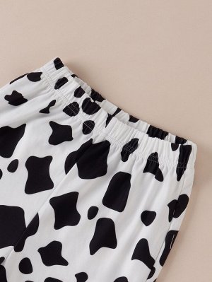 Костюм черный: топ и штаны белые клёш с коровьим принтом
