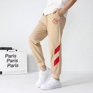 Однотонные спортивные брюки для мальчиков, с контрастными  вставками по бокам брючин