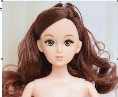 Кукла без одежды с распущенными темными волосами