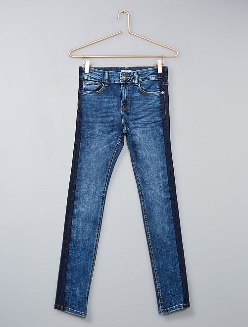 Очень узкие джинсы с полосками по бокам