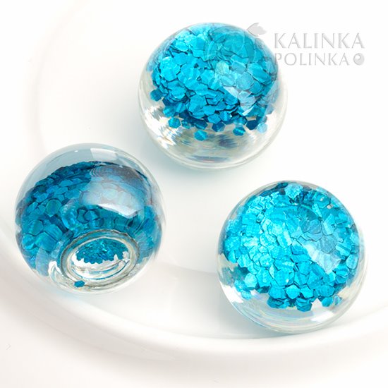 Кабошон - стеклянный флакон, залитый эпоксидной смолой с голубыми блёстками, р-р 16х15мм.