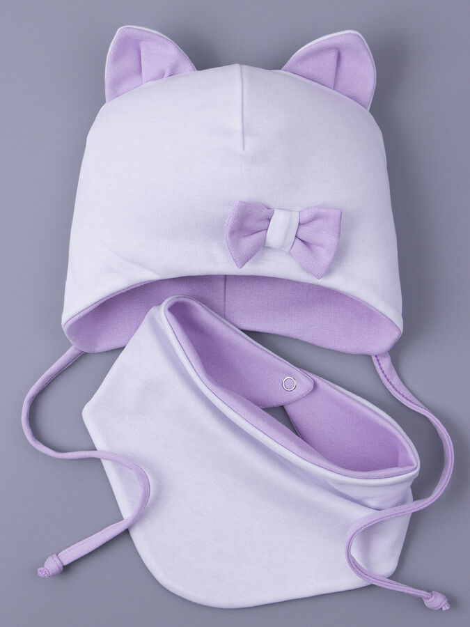 Шапка трикотажная для девочки, кошачьи ушки, на завязках, сбоку лиловый бантик + нагрудник, белый